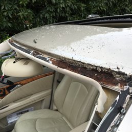 This is what can happen if you don't use the right guys -- someone failed to prime the metal under the windshield. This is what can happen if you don't use the right guys -- someone failed to prime the metal under the windshield.