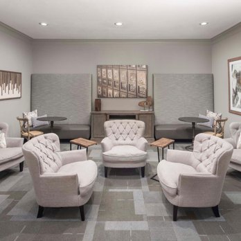 Camden Buckingham Apartments - Community meeting room with seating and tables at Camden Buckingham - Apartments Near Me - Richardson, Texas