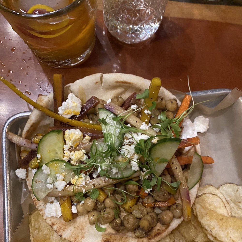 Taproot Cider House - Root fashioned, pita wrap with grilled chicken - Bars Near Me - Traverse City, Michigan Taproot Cider House - Root fashioned, pita wrap with grilled chicken - Bars Near Me - Traverse City, Michigan