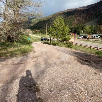 Canyonside Campground - One of the two driveways into the campground right from the highway. - Campgrounds Near Me - Bellvue, Colorado