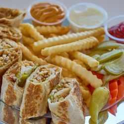 One Stop Gyros & Burritos - Spicy chicken shawarma thinly sliced marinated and cooked traditionally on a vertical rotisserie,also with our hand made spicy garlic sauce