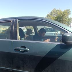 Smiths Food & Drug Centers - "customer" in smiths parking lot getting his high on