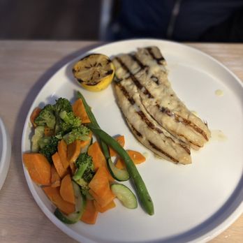 Seminole Reef Grill - Three Tail Fish w/vegetables - Seafood Near Me - North Palm Beach, Florida Seminole Reef Grill - Three Tail Fish w/vegetables - Seafood Near Me - North Palm Beach, Florida