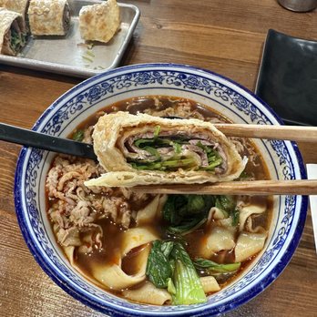 Northern Cafe - Hot & spicy prime beef noodle soup w/ wide noodles + beef roll - Chinese Near Me - Gardena, California Northern Cafe - Hot & spicy prime beef noodle soup w/ wide noodles + beef roll - Chinese Near Me - Gardena, California