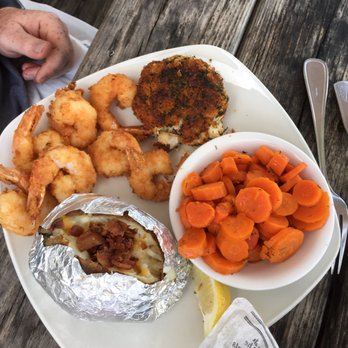 Miller's Waterfront Restaurant - Build your own with crabcake and fried shrimp. Honey glazed carrots and a loaded potato round it out - Seafood Near Me - Nags Head, North Carolina Miller's Waterfront Restaurant - Build your own with crabcake and fried shrimp. Honey glazed carrots and a loaded potato round it out - Seafood Near Me - Nags Head, North Carolina