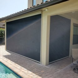 Harrison Awnings - SunPro Motorized Screens in Beige Frames with Solar Screen material in Parkland FL