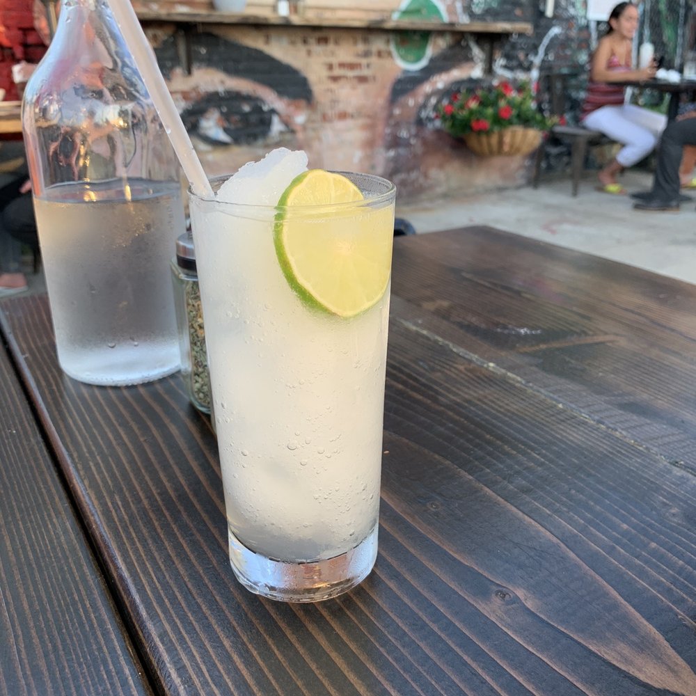 Hoek Pizza - a glass of lemonade and a bottle of water - Bars Near Me - Brooklyn, New York Hoek Pizza - a glass of lemonade and a bottle of water - Bars Near Me - Brooklyn, New York
