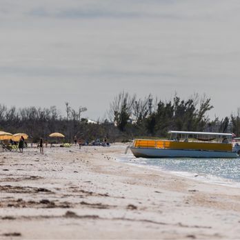 Adventures In Paradise - Their boat on North Captiva. - Boating Near Me - Fort Myers, Florida