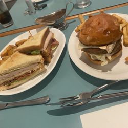 Club sandwich with home made fries Bacon, Swiss, Mushroom Burger with fries and gravy