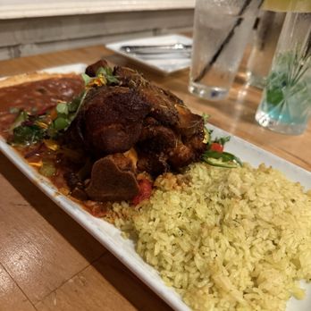 Villa Montez - Osso Buco/ pork, fall of the bone, rich in flavors, moist in texture. Plentiful! - Latin American Near Me - Tyler, Texas Villa Montez - Osso Buco/ pork, fall of the bone, rich in flavors, moist in texture. Plentiful! - Latin American Near Me - Tyler, Texas