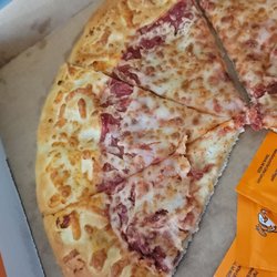 Little Caesar's Pizza - Paper thin layer of cheese and it doesn't even cover the pizza