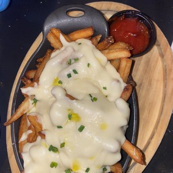 The Trestle - Truffle Cheese Fries - Cocktail Bars Near Me - Astoria, New York The Trestle - Truffle Cheese Fries - Cocktail Bars Near Me - Astoria, New York
