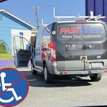 FASTSIGNS - Fast Signs van parked at angle blocking 2 parking spaces. One of which was for handicap parking only.  What a dick move! - Graphic Design Near Me - Sacramento, California