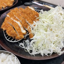 Chicken Katsu and shredded cabbage salad Chicken Katsu and shredded cabbage salad