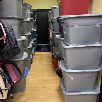 Kid to Kid - Storage bins they have to bring in/put out over stock in the hall where the emergency exit & restroom is. Stacked taller than me - Children's Clothing Near Me - Keller, Texas Kid to Kid - Storage bins they have to bring in/put out over stock in the hall where the emergency exit & restroom is. Stacked taller than me - Children's Clothing Near Me - Keller, Texas