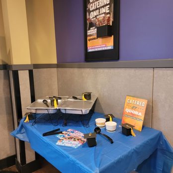 QDOBA Mexican Eats - a blue table with food on it - Mexican Near Me - Plymouth, Minnesota QDOBA Mexican Eats - a blue table with food on it - Mexican Near Me - Plymouth, Minnesota