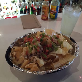 Eat the Worm - Nachoes smothered in white cheese sauce - Mexican Near Me - Omaha, Nebraska Eat the Worm - Nachoes smothered in white cheese sauce - Mexican Near Me - Omaha, Nebraska