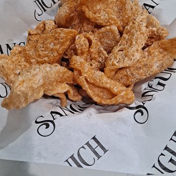 Sanguich - Freshly made chicharons. Light, crispy and super delicious. There was a bit more that we ate before I thought to take a picture. - Cuban Near Me - Miami, Florida Sanguich - Freshly made chicharons. Light, crispy and super delicious. There was a bit more that we ate before I thought to take a picture. - Cuban Near Me - Miami, Florida