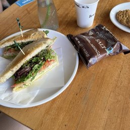 Tuna sandwich, chips, maple walnut cookie, steamed milk.
