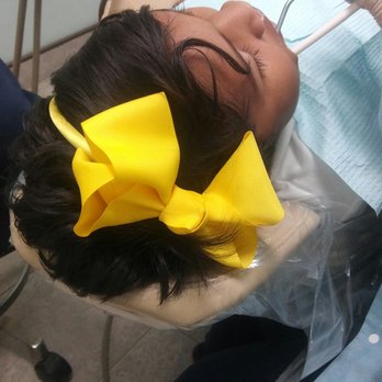 National Dental - Vivian is super proud of her nice teeth - General Dentistry Near Me - Long Beach, California