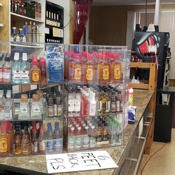 Wandering Spirits - a display of liquor bottles in a liquor store - Beer, Wine & Spirits Near Me - Minneapolis, Minnesota Wandering Spirits - a display of liquor bottles in a liquor store - Beer, Wine & Spirits Near Me - Minneapolis, Minnesota