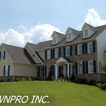 LawnPro - the front of a house with a lawn in front of it - Landscaping Near Me - Madison, Tennessee LawnPro - the front of a house with a lawn in front of it - Landscaping Near Me - Madison, Tennessee