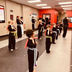UpLevel Martial Arts- Fort Mill - Beginner students practicing nunchucks.