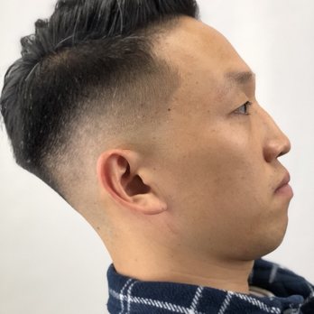 Filthy Rich Barbershop - Mid skin fade with texturized shear work on top by DK. - Barbers Near Me - Woodside, New York Filthy Rich Barbershop - Mid skin fade with texturized shear work on top by DK. - Barbers Near Me - Woodside, New York