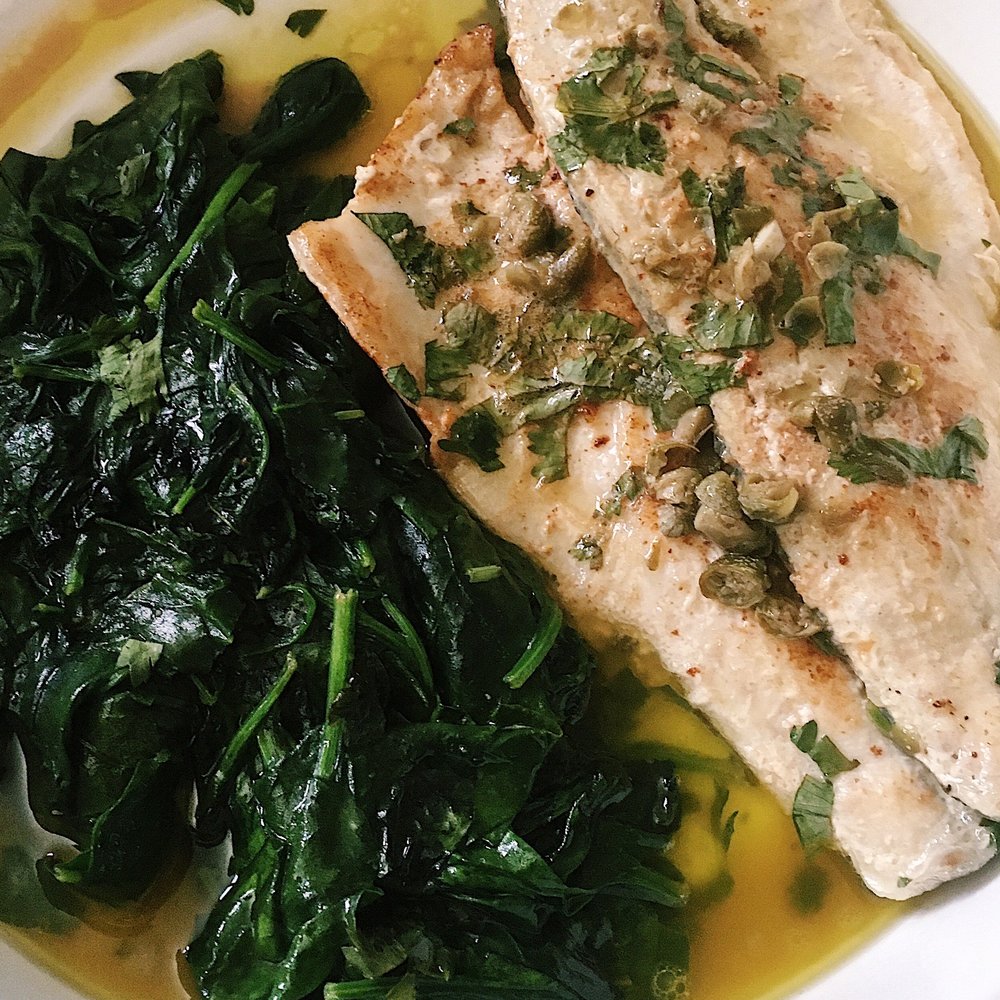 Belo Bar & Kitchen  - Pan seared bronzino served with sautéed spinach - New American Near Me - Hoboken, New Jersey