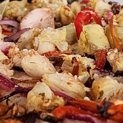 The Star on Park - No, this is not the rubble on the moon. It's a thin crust with double artichoke, garlic, onions, peppers, mushrooms and spinach.