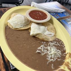 Cafe Flores - Huevos Rancheros a no go, avoid. Bland, served at room temperature and bottled taco sauce.