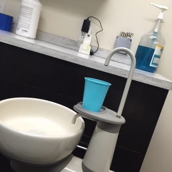 White Plains Dental Care - Sitting in dental chair. - Oral Surgeons Near Me - White Plains, New York White Plains Dental Care - Sitting in dental chair. - Oral Surgeons Near Me - White Plains, New York