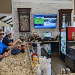 The Frog Golf Club - Inside the clubhouse at the turn. Picking up food and drinks at the bar and grill at the turn.