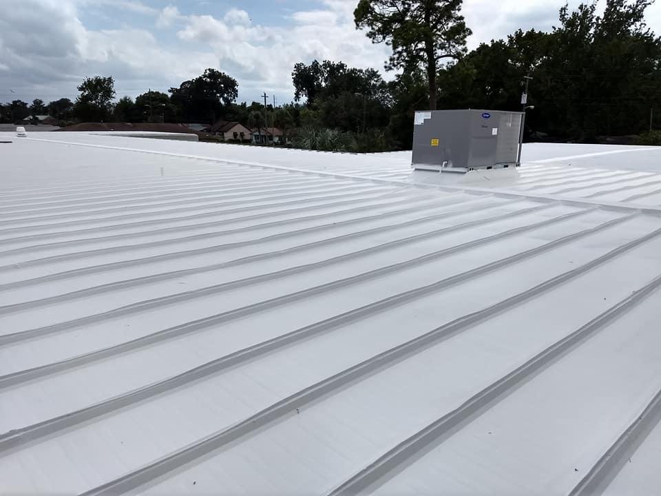 Slide of K & C Seamless Roofing