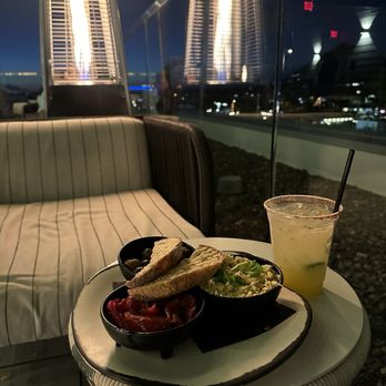Outrider Rooftop Lounge - Tapas Platter with a mock-tail - Cocktail Bars Near Me - Scottsdale, Arizona Outrider Rooftop Lounge - Tapas Platter with a mock-tail - Cocktail Bars Near Me - Scottsdale, Arizona