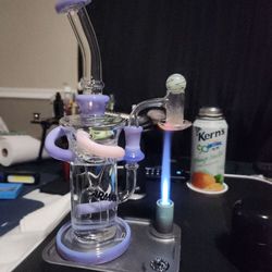 Gorillazone smoke shop - I like small recyclers this is my biggest measuring in at 13". Sitting on my Slate from yocan as you can see the torch still reach.