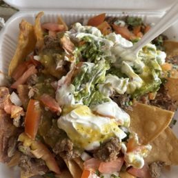 Nachos Grande with carne asada Nachos Grande with carne asada