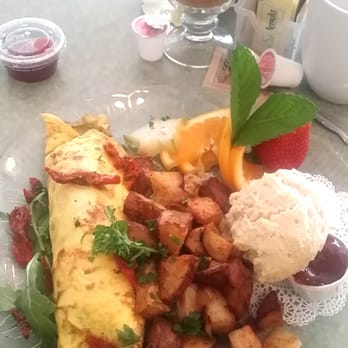 Wildflower Cafe - Wildflower signature crepe with oven roasted potatoes and buttermilk biscuit (awesome) - Breakfast & Brunch Near Me - Clearwater, Florida Wildflower Cafe - Wildflower signature crepe with oven roasted potatoes and buttermilk biscuit (awesome) - Breakfast & Brunch Near Me - Clearwater, Florida