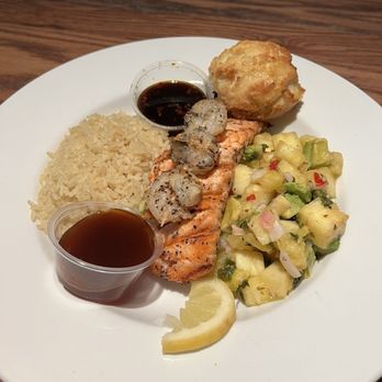 Cheesecake Bistro by Copeland's - Island Grilled Salmon & Shrimp,  Tropical seasonings, poke marinade, jasmine rice, island glaze, grilled pineapple & avocado salsa. - Desserts Near Me - Baton Rouge, Louisiana
