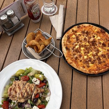 Squatters Pubs - Greek Salad with chicken, Hot Honey Sausage Pizza, and sidewinder fries - Brewpubs Near Me - Salt Lake City, Utah