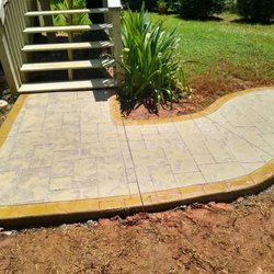 M. Luke Concrete - Custom walkway. Stamped concrete with stain borders. Another satisfied customer.