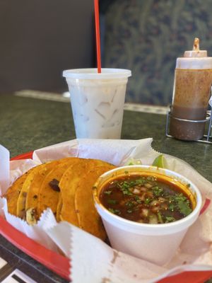 Photo of La Reyna Azteca Tacos Y Tortas - Denver, CO, US. 3 quesabirrias and consome