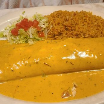 Chuy's - Big as your head burrito with roasted chicken smothered in queso sauce. - Bars Near Me - Indianapolis, Indiana