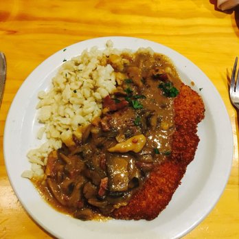 Royal Bavaria - Pork Schnitzel with mushroom bacon gravy.Spaetzle was also delicious. - German Near Me - Moore, Oklahoma Royal Bavaria - Pork Schnitzel with mushroom bacon gravy.Spaetzle was also delicious. - German Near Me - Moore, Oklahoma