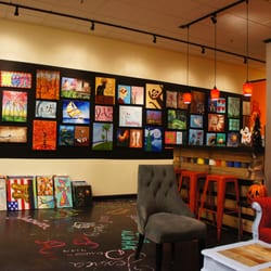 Spirited Art - More paintings on the wall and on the floor