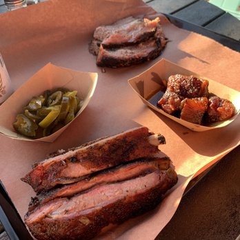 Heim Barbecue - River - Brisket, bacon burnt ends, and ribs. And oh yes, the requisite vegetable (which is really a fruit), jalapeños! - Barbeque Near Me - Fort Worth, Texas Heim Barbecue - River - Brisket, bacon burnt ends, and ribs. And oh yes, the requisite vegetable (which is really a fruit), jalapeños! - Barbeque Near Me - Fort Worth, Texas