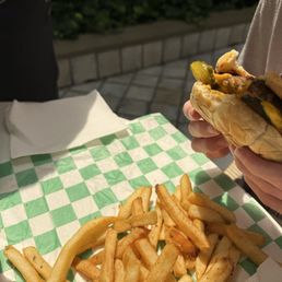 Simple burger with cheese and fries Simple burger with cheese and fries