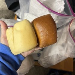 Texas Roadhouse - The two different kinds of rolls we received ... one is burnt and one is not. We had to bring them back to prove it to Cheyenne.