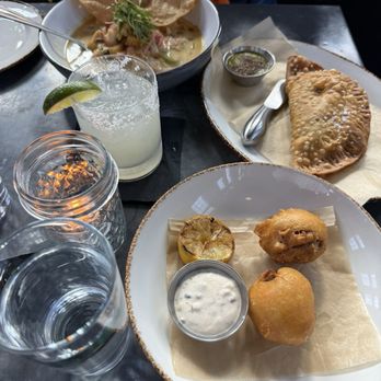 The Ice Plant - Blue Crab Beignets, LAMB & CHICKPEA EMPANADA, and LOCAL SHRIMP CEVICHE - Cocktail Bars Near Me - St. Augustine, Florida The Ice Plant - Blue Crab Beignets, LAMB & CHICKPEA EMPANADA, and LOCAL SHRIMP CEVICHE - Cocktail Bars Near Me - St. Augustine, Florida