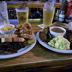 Texas Cafe & Bar - 2 meat combo plate with 2 sides.